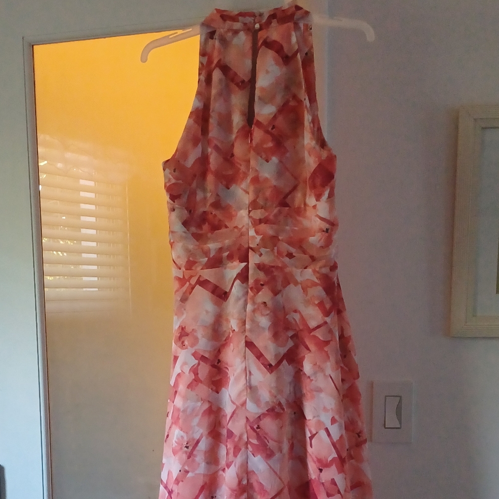 A beautiful dress wore once to daughters wedding